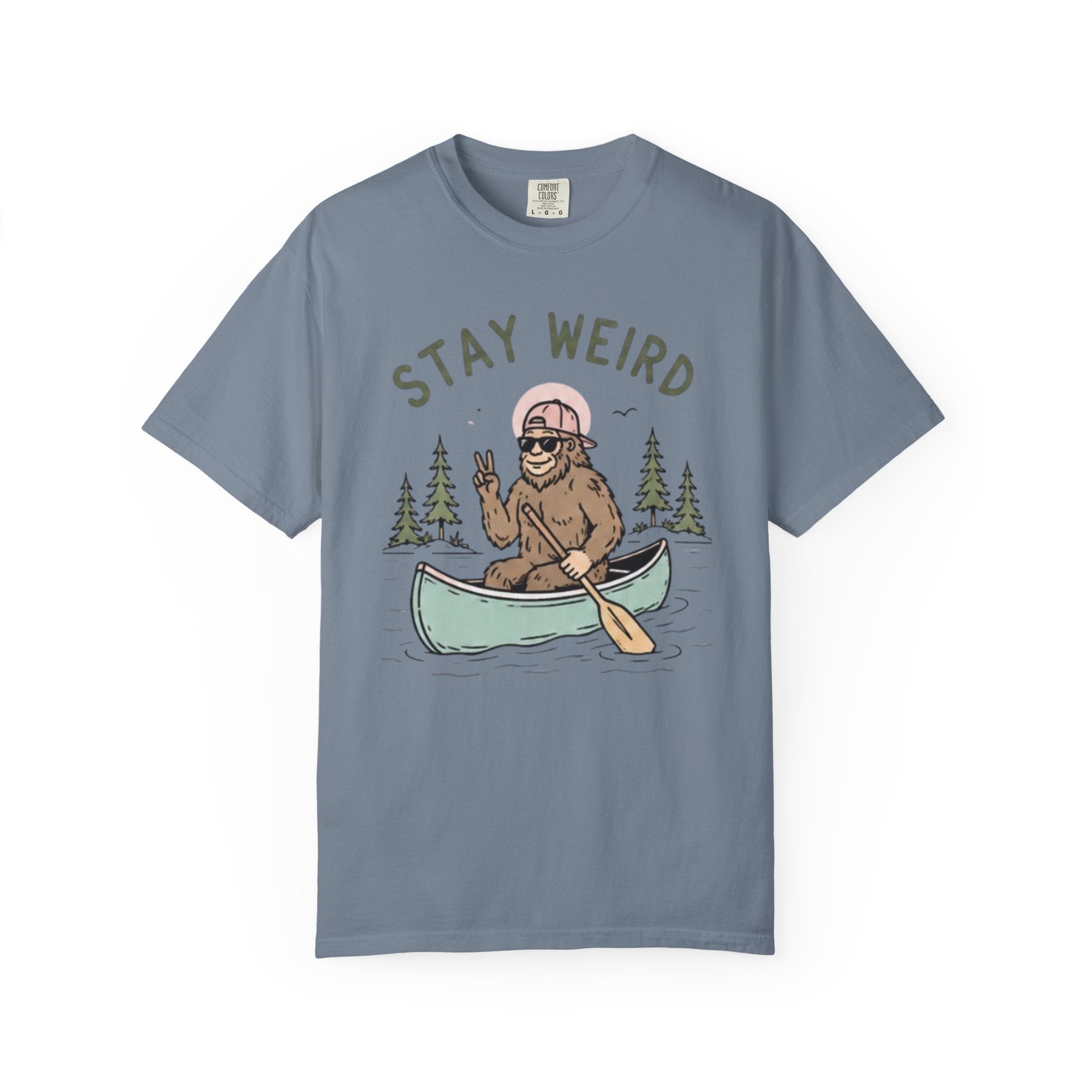 Stay Weird Canoe T-Shirt | Funny Bigfoot Paddling Outdoors Graphic Tee