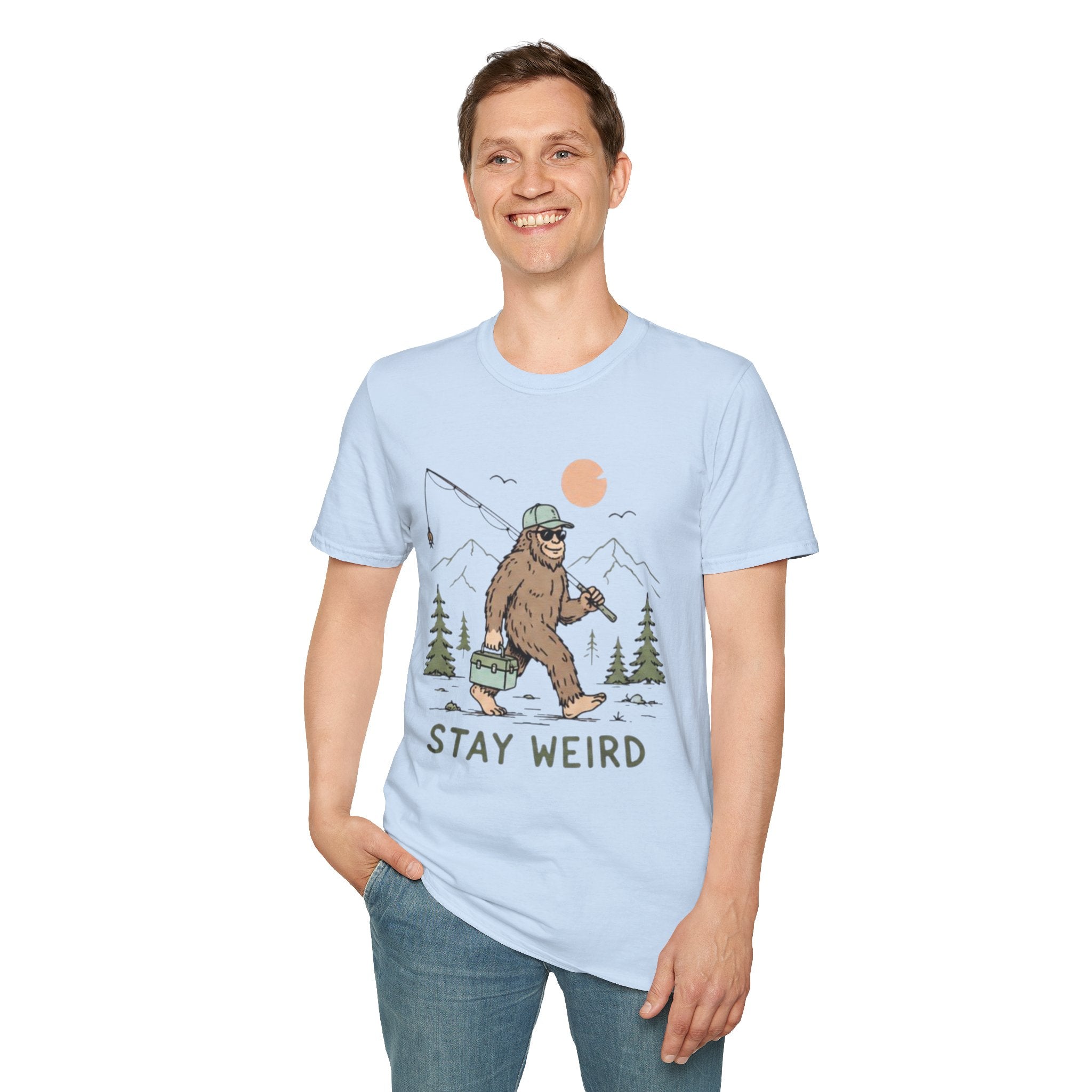 Stay Weird Bigfoot Fishing T-Shirt | Funny Sasquatch Graphic Tee for Nature Lovers