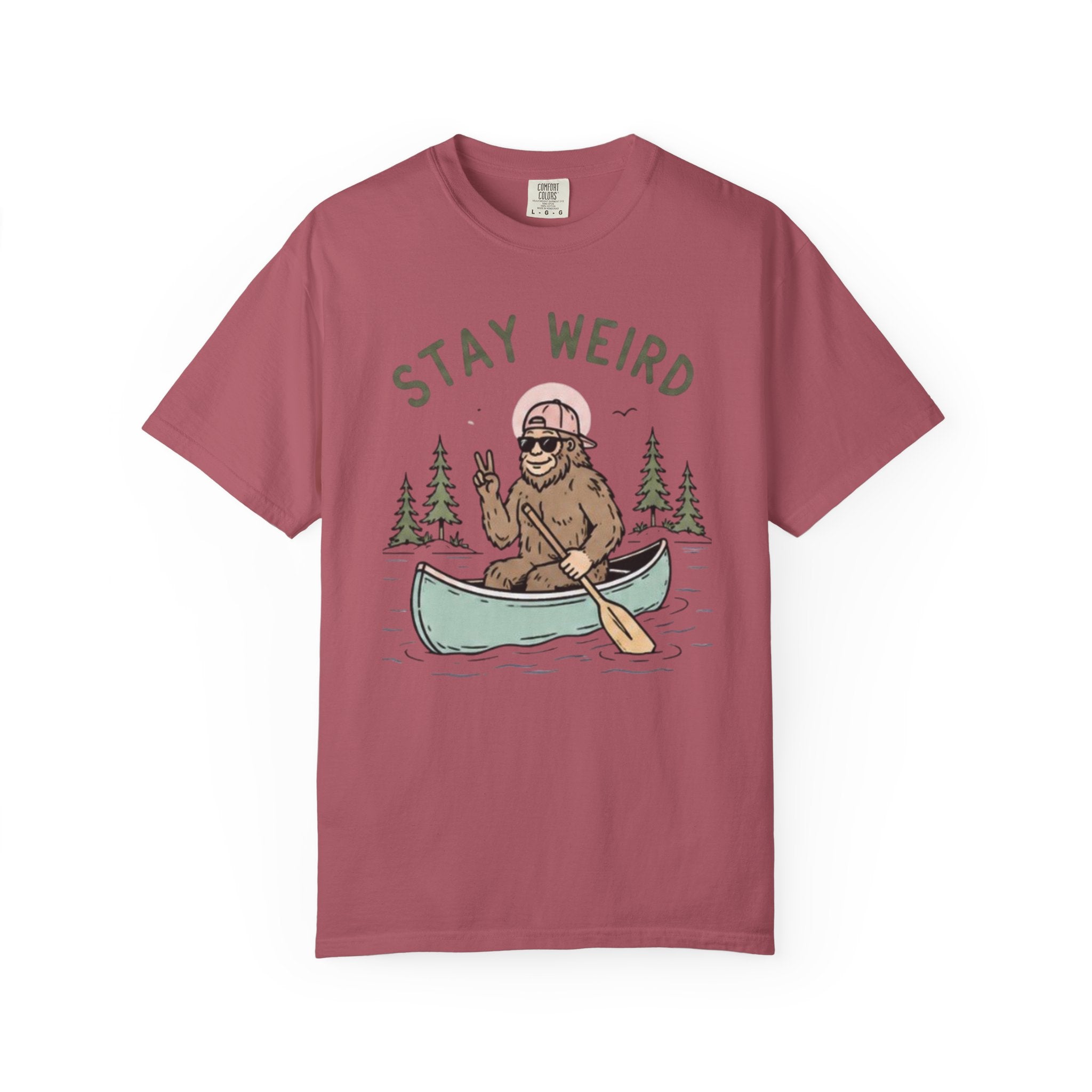 Stay Weird Canoe T-Shirt | Funny Bigfoot Paddling Outdoors Graphic Tee