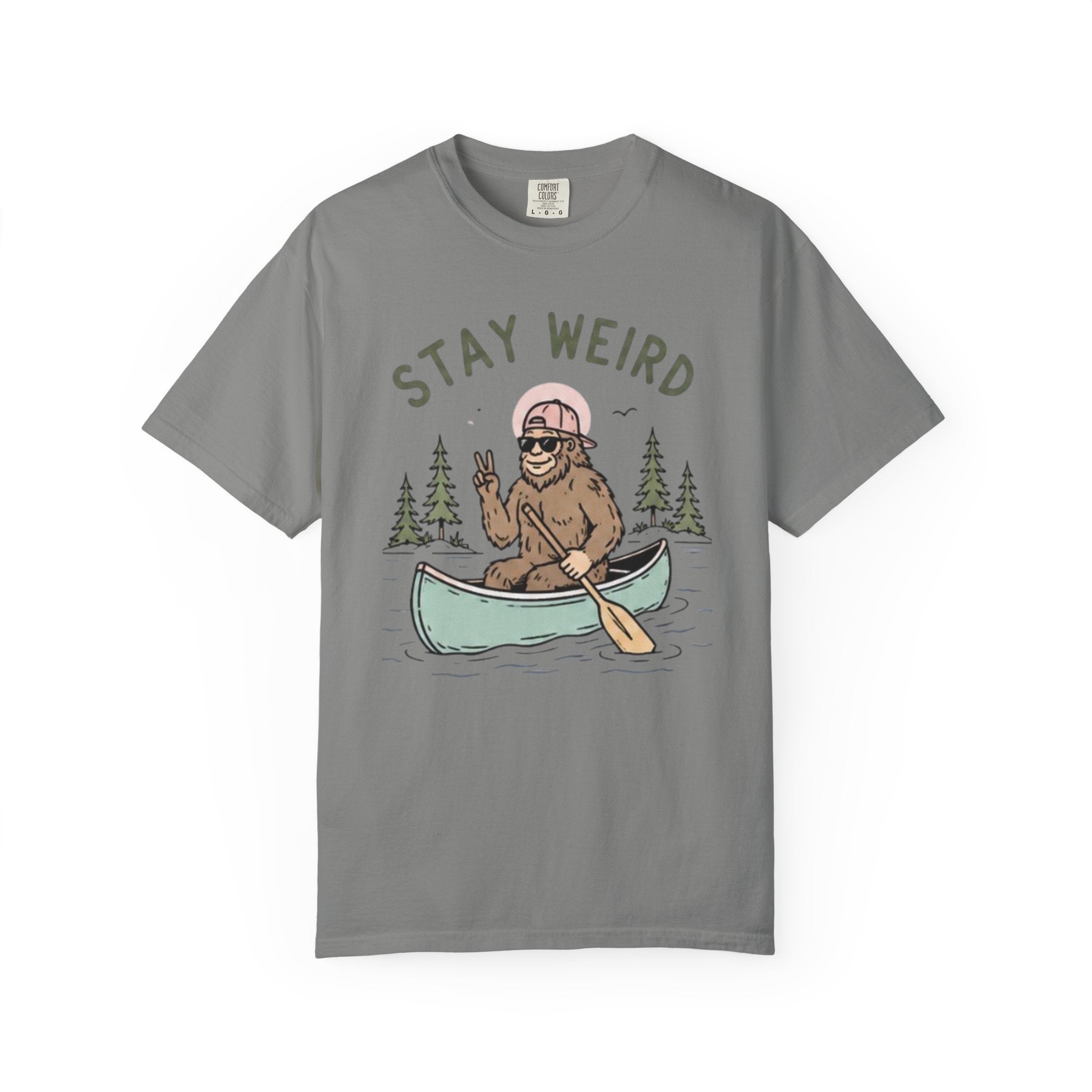 Stay Weird Canoe T-Shirt | Funny Bigfoot Paddling Outdoors Graphic Tee