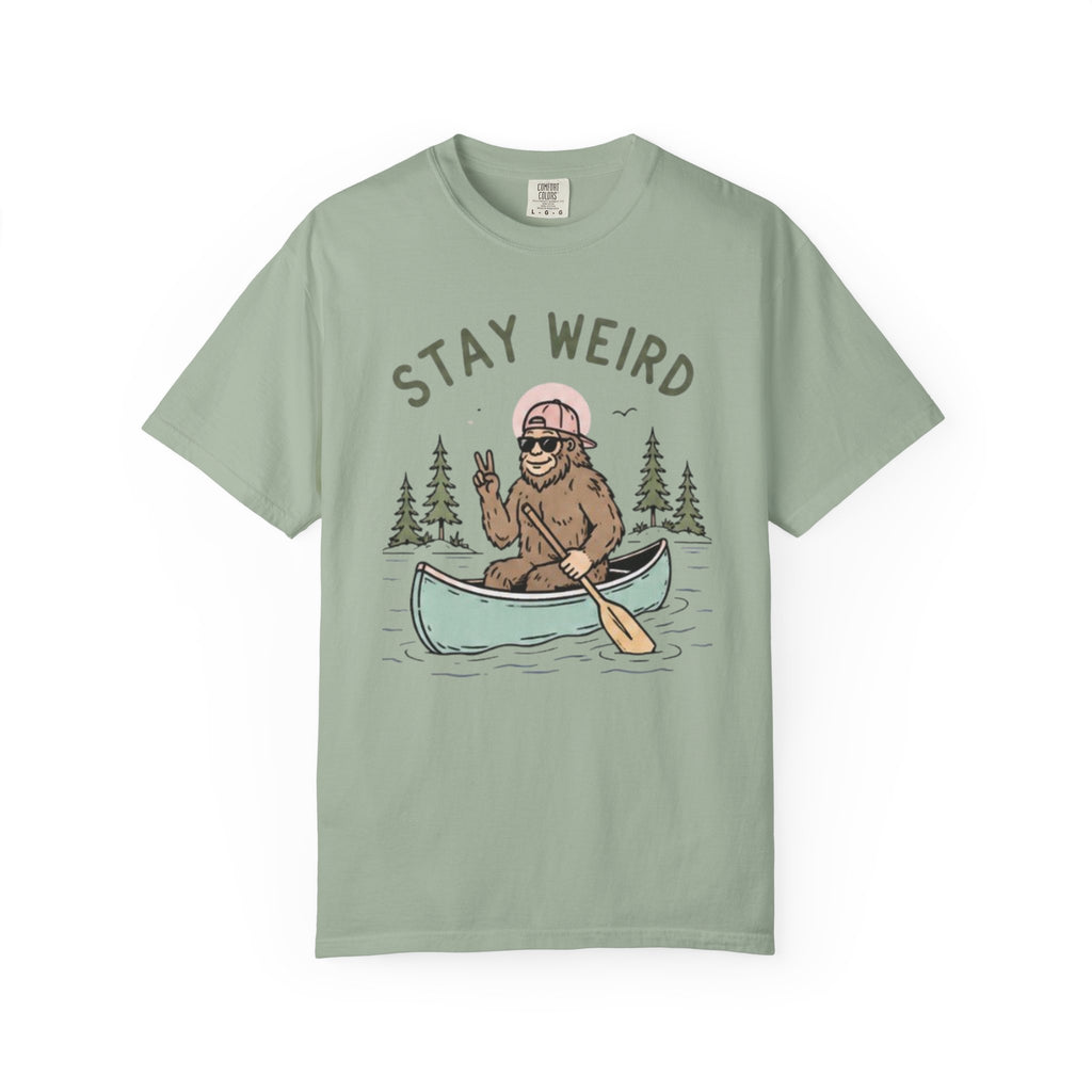 Stay Weird Canoe T-Shirt | Funny Bigfoot Paddling Outdoors Graphic Tee