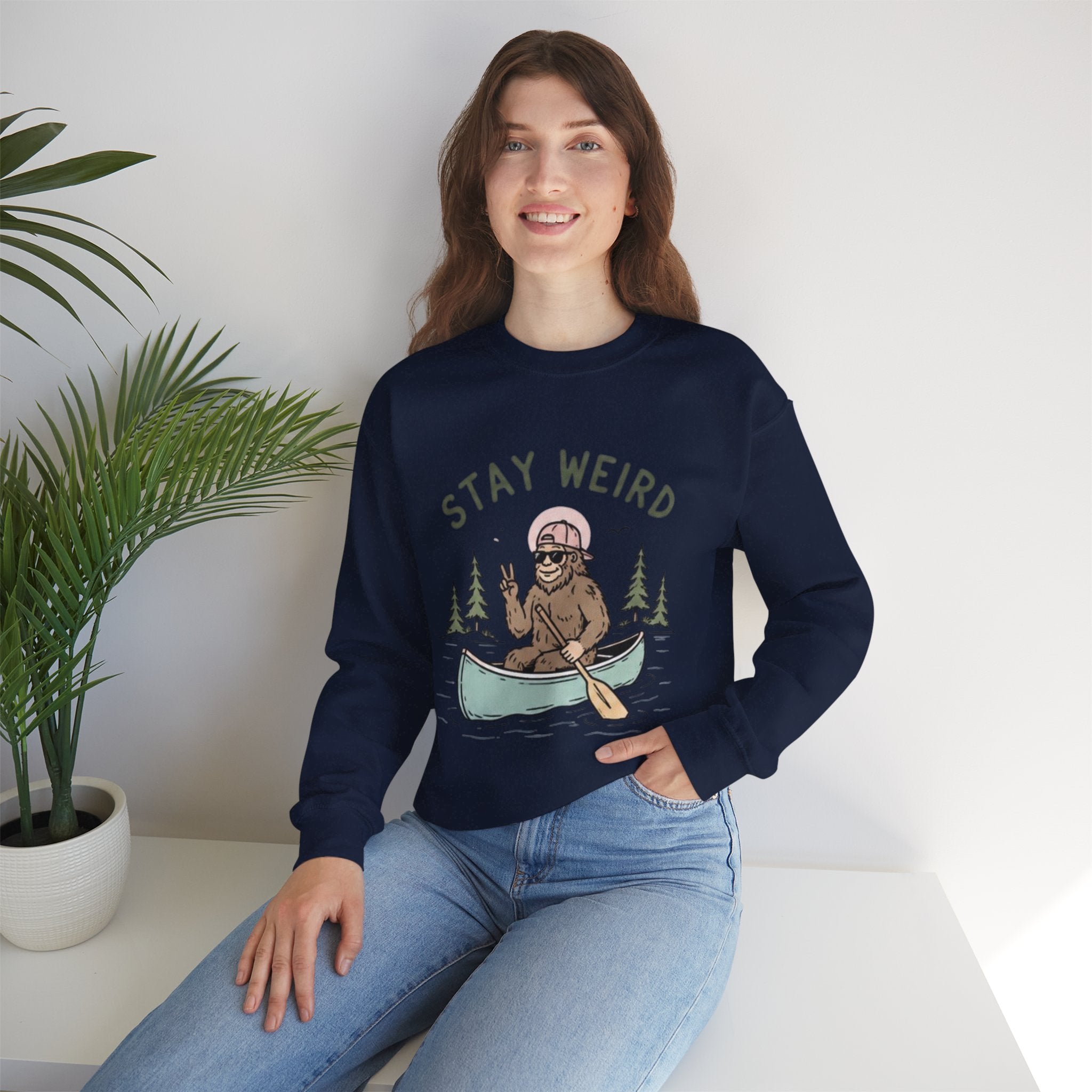 Stay Weird Sasquatch Canoe Crewneck Sweatshirt