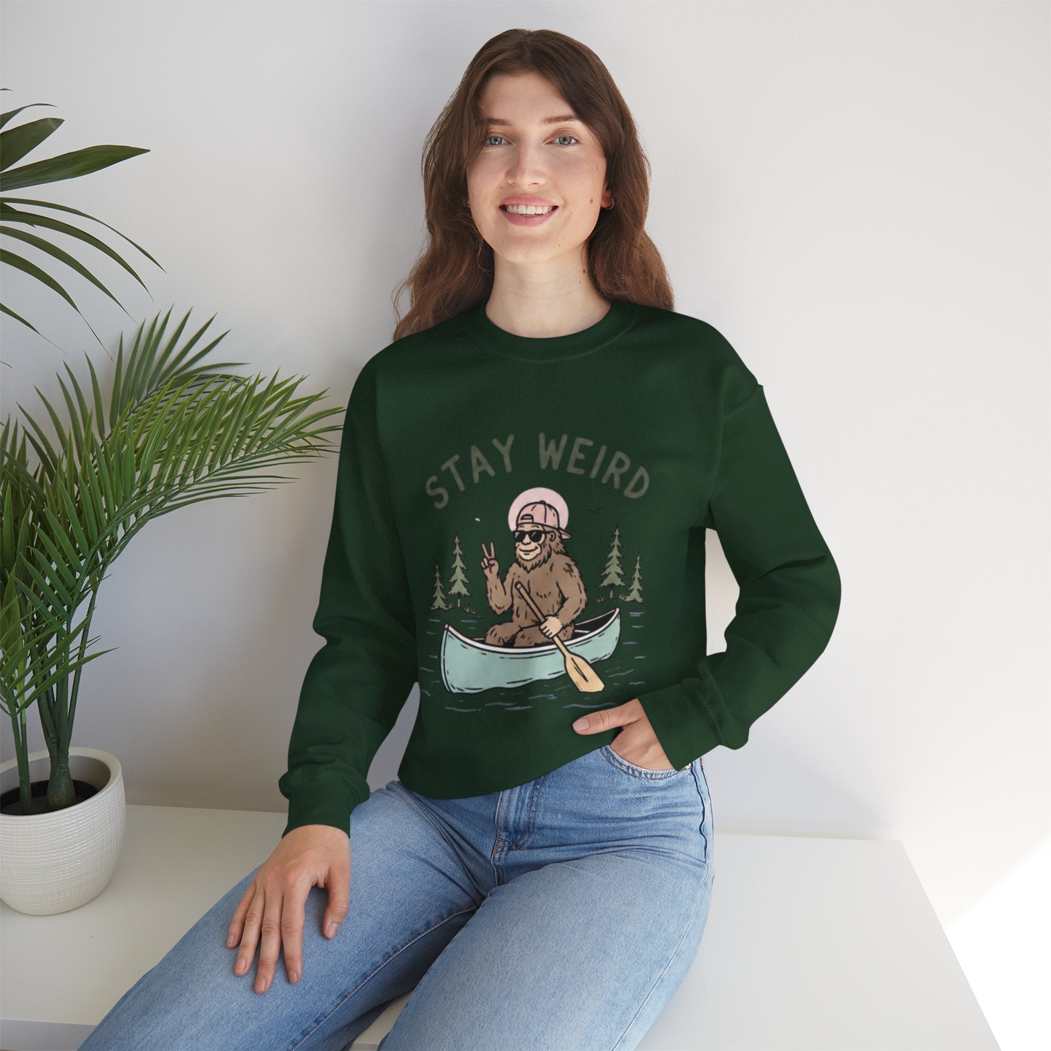 Stay Weird Sasquatch Canoe Crewneck Sweatshirt